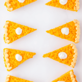 Rice Krispie Treats made with marshmallow fluff, golden and gooey.