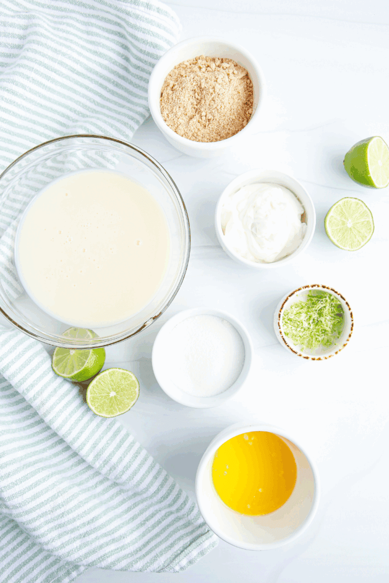Whisking eggs, sugar, salt, key lime juice, and zest in a saucepan.