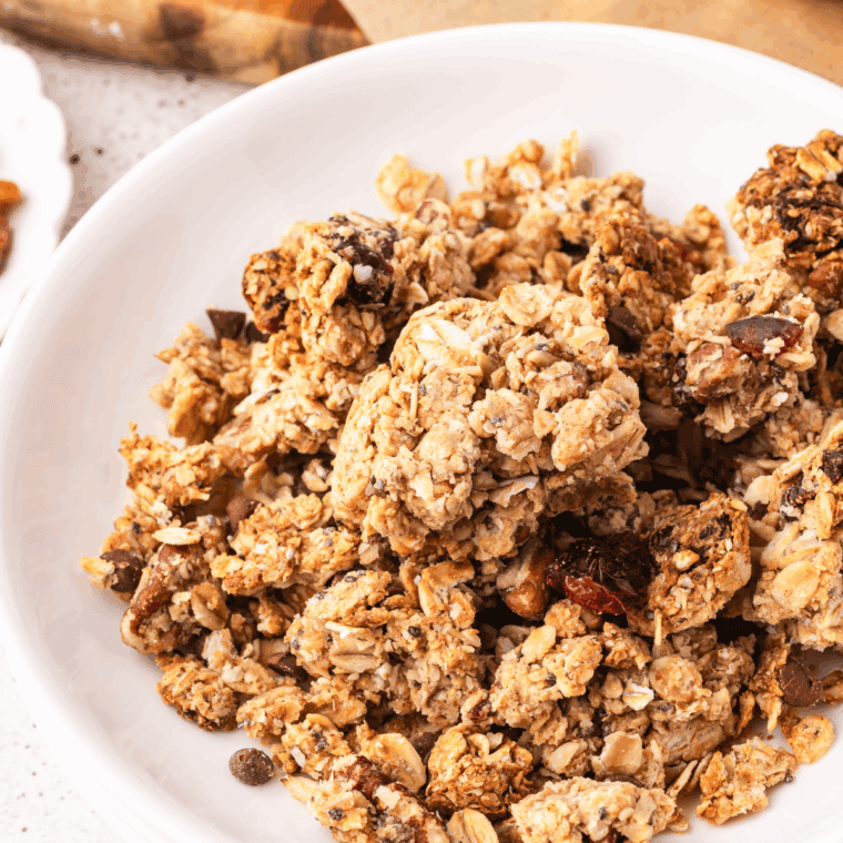 Homemade Low FODMAP granola made with oats, seeds, and nuts, offering a crunchy, digestive-friendly snack option.