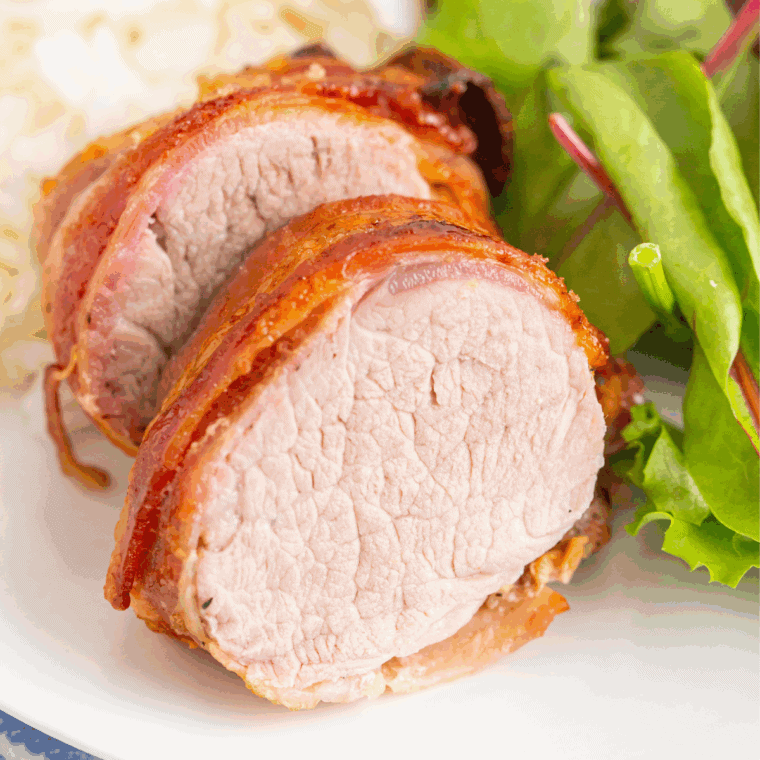 Ninja Air Fryer Bacon Wrapped Pork Tenderloin with crispy bacon and tender, juicy pork.