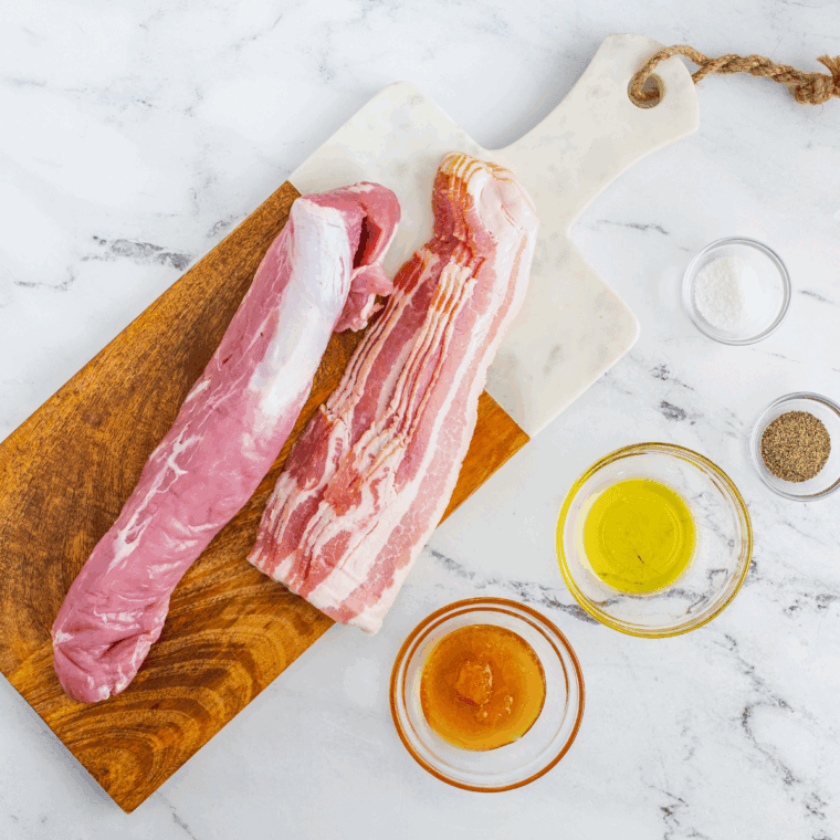 Ingredients needed for Ninja Air Fryer Bacon Wrapped Pork Tenderloin on kitchen table.