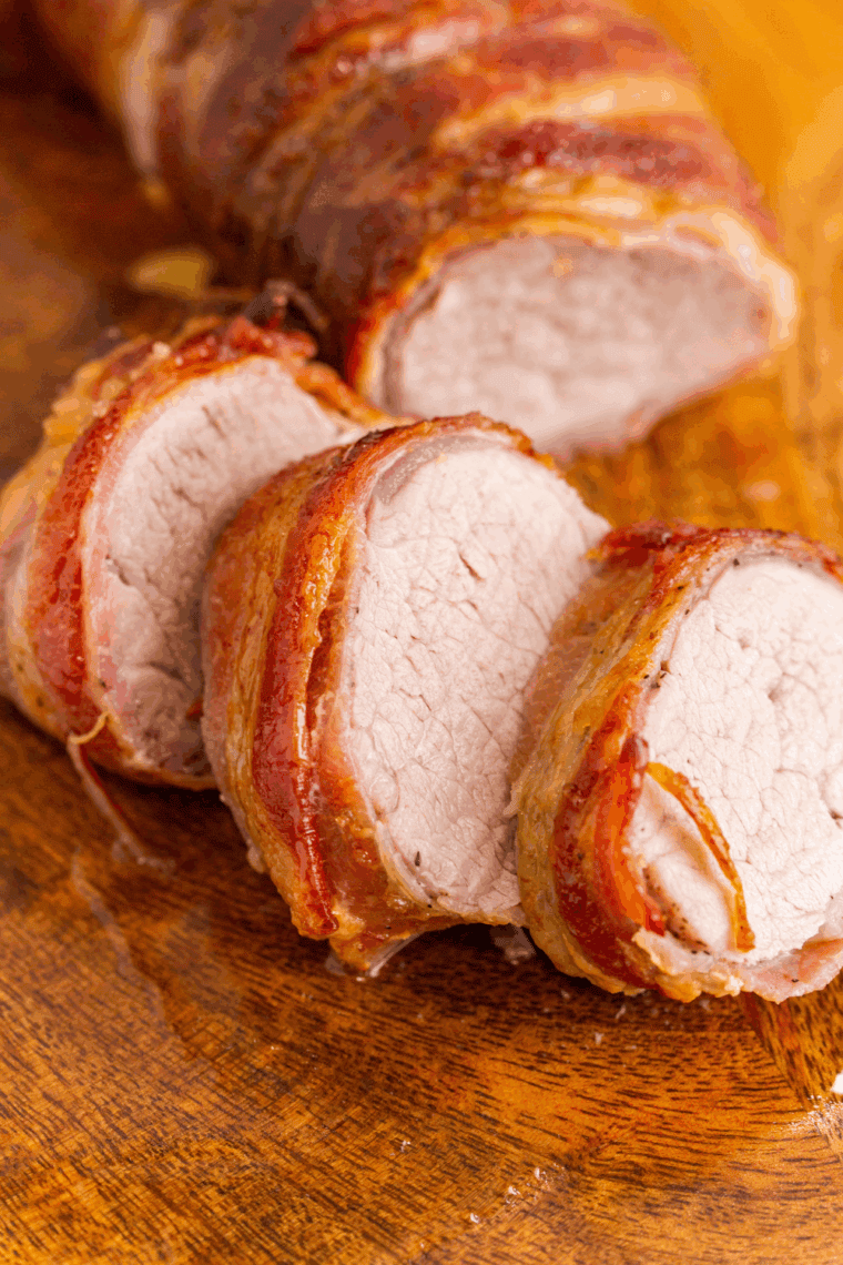 Ninja Air Fryer Bacon Wrapped Pork Tenderloin with crispy bacon and juicy pork.
