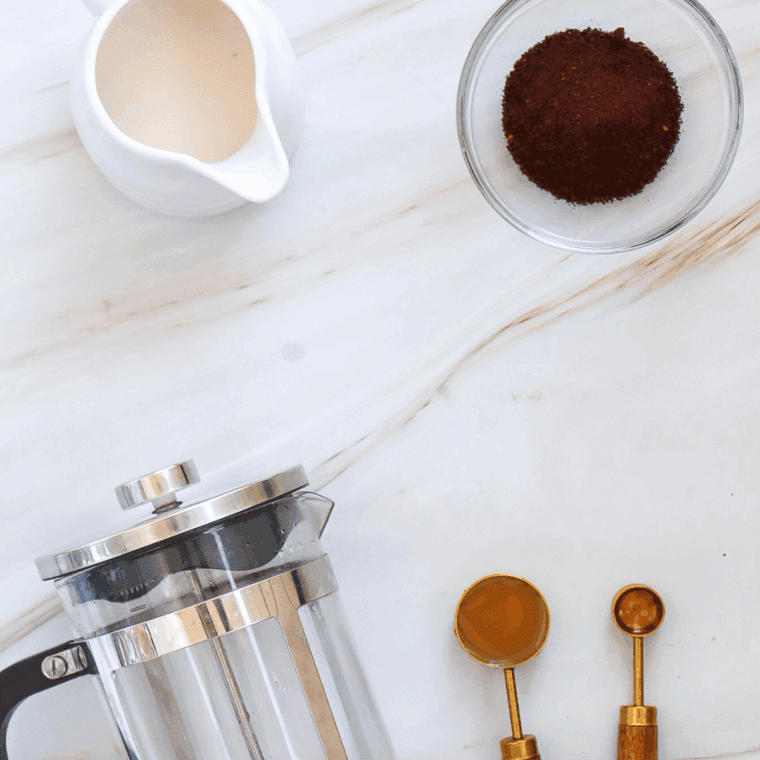 Ingredients needed for Ninja Creami Caramel Iced Coffee Starbucks on kitchen table.
