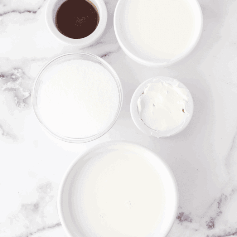 Ingredients needed for Ninja Creami Mexican Vanilla Ice Cream on kitchen table.