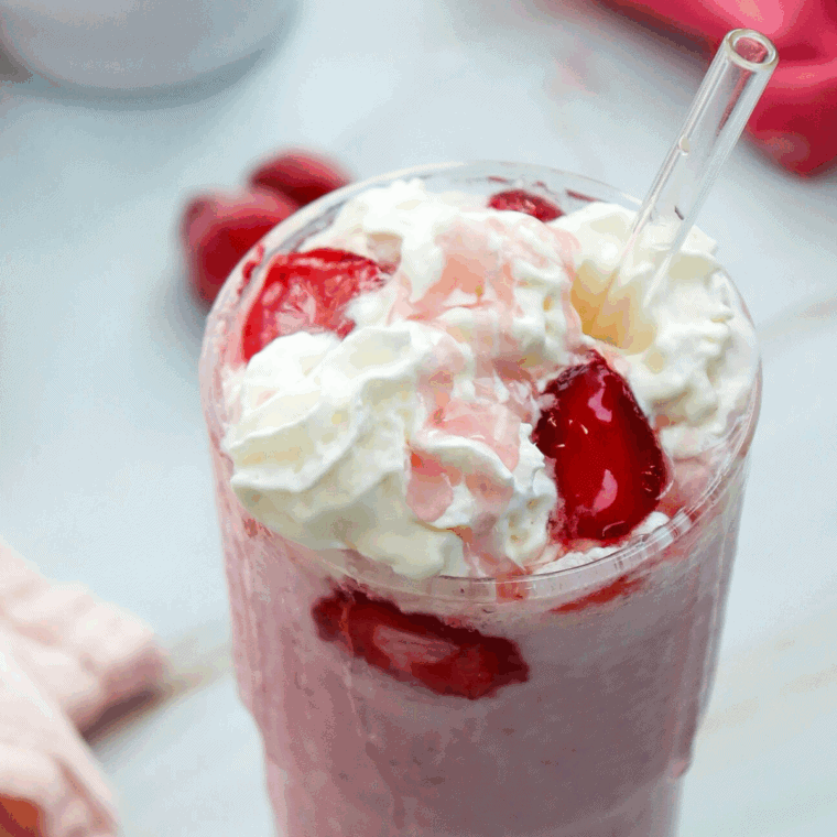 Ninja Creami Starbucks Strawberry Cheesecake Frappuccino with creamy cheesecake and strawberries.