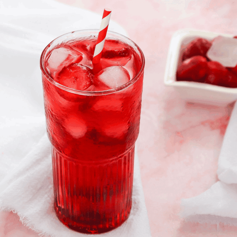 Ninja Creami Strawberry Acai Refresher, a refreshing blend of strawberries, açai, and lemon, made smooth and creamy in the Ninja Creami.