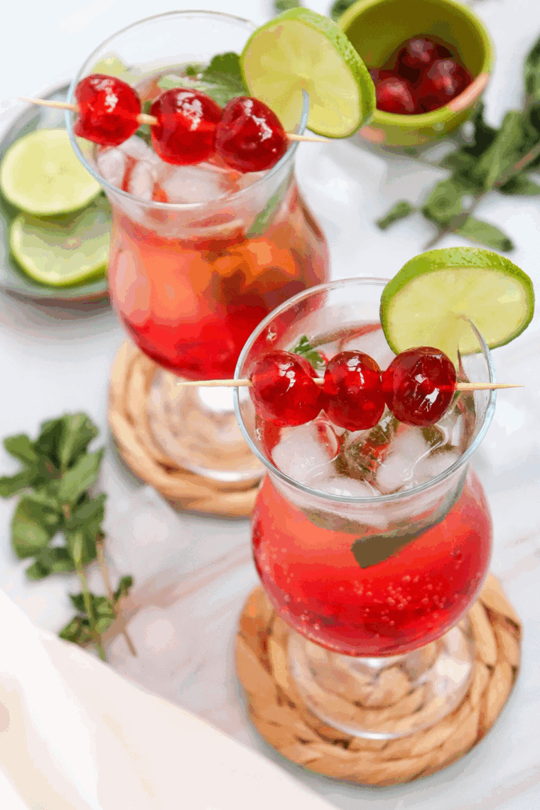 Ninja Slushi Shirley Temple Slush, a fun and refreshing icy treat made with lemon-lime soda, grenadine, and cherries, perfect for a summer day.