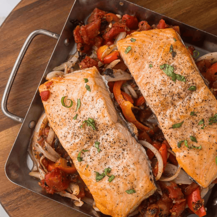 Air-fried salmon fillets topped with fresh tomato-basil bruschetta and balsamic glaze, inspired by Olive Garden.