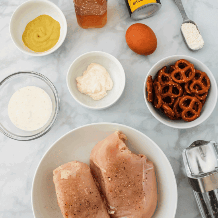 Ingredients needed for Shake 'N Bake Crunchy Pretzel Seasoned Coating Mix Recipe on kitchen table.