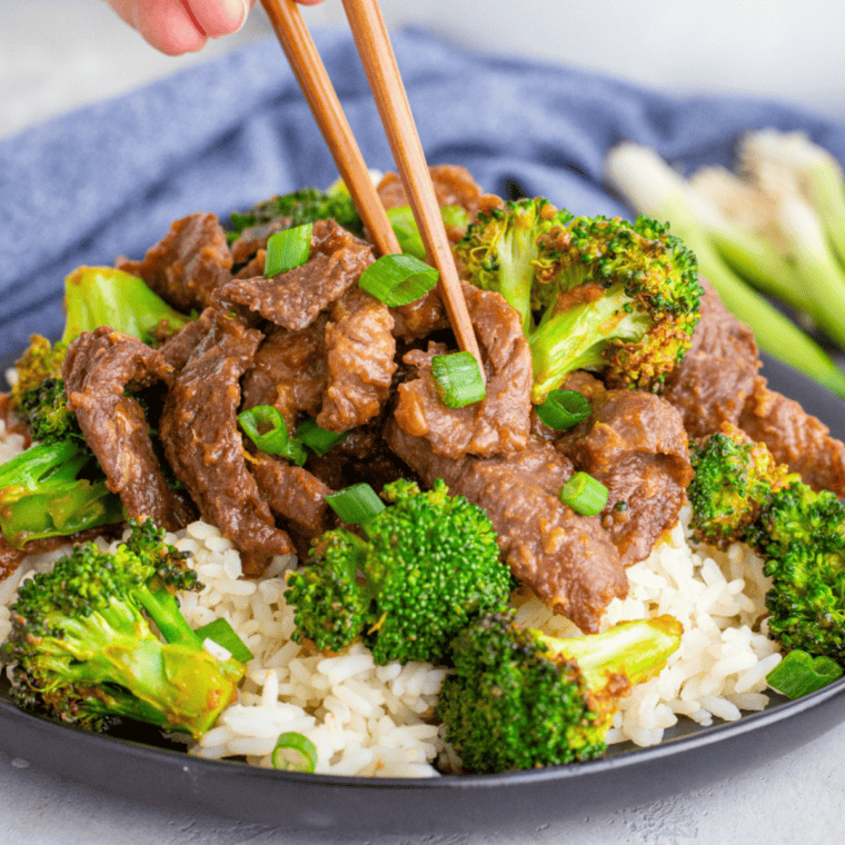 Sheet Pan Beef and Broccoli Freezer Meal with tender beef, fresh broccoli, and a savory sauce ready to bake.