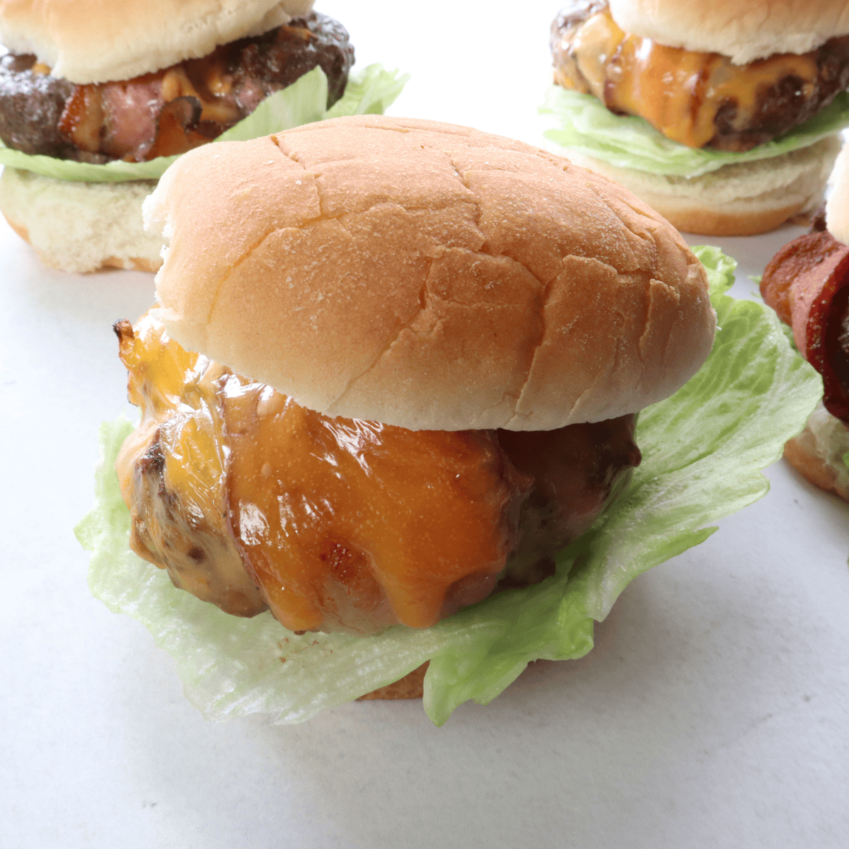 Air Fryer Beer Can Burger with juicy patties, melted cheese, and fresh toppings, cooked to perfection in the air fryer.