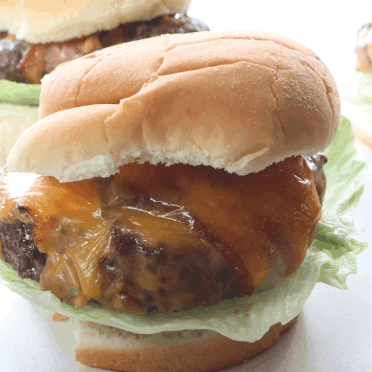 Air Fryer Beer Can Burger with juicy patties, melted cheese, and fresh toppings, cooked in the air fryer for a delicious meal.