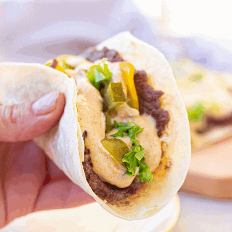 Air Fryer Big Mac Smash Tacos with juicy beef, melted cheese, and a crispy taco shell, all made to perfection in the air fryer.