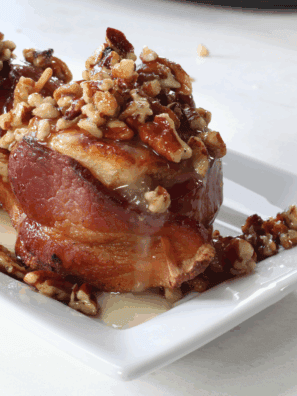 Air Fryer Bourbon Bacon Cinnamon Rolls with a crispy exterior, gooey cinnamon filling, and topped with crispy bacon and a hint of bourbon.