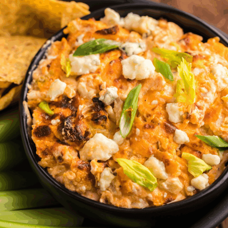 Fryer buffalo cauliflower dipped in cream cheese, spicy buffalo sauce and crispy cauliflower for a delicious, healthy appetizer.