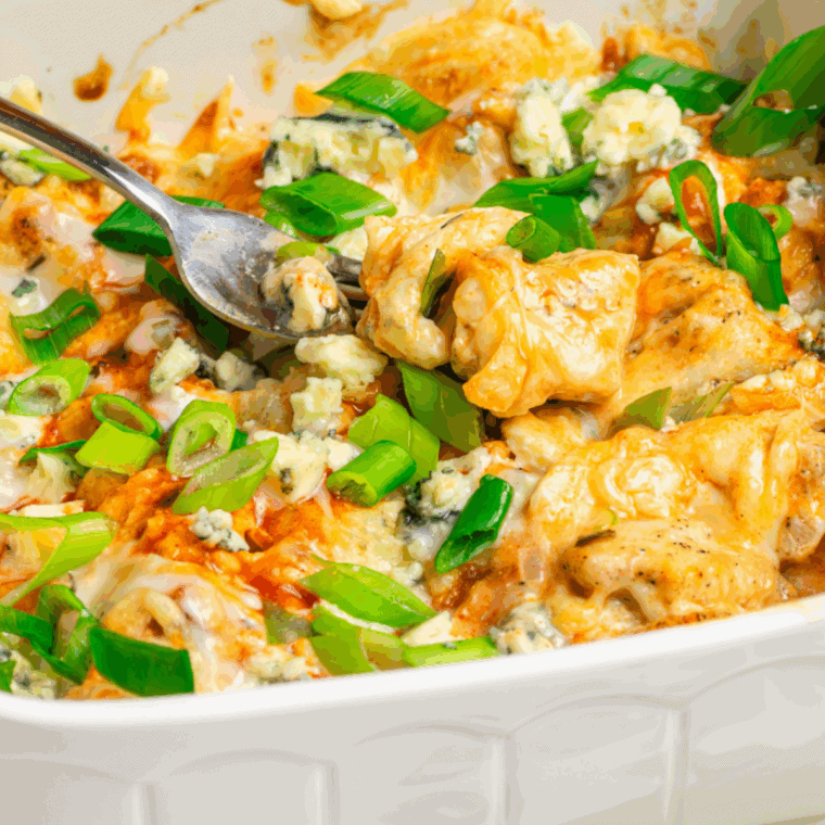 Air Fryer Domino's Hot Buffalo Chicken Bake with crispy chicken, spicy buffalo sauce, melted cheese, and a savory crust.