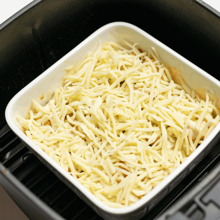 Sprinkle cheese into the dish and return to air fryer.