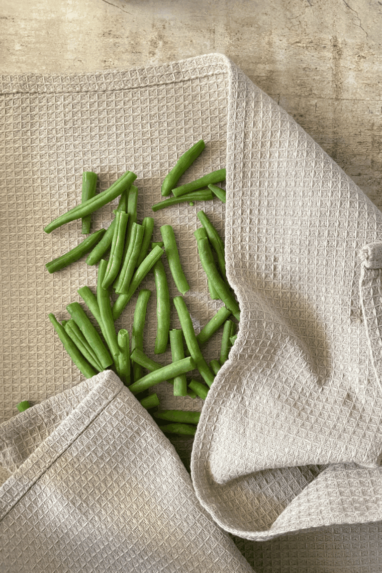 Dry green beans off completely, before adding them to the air fryer.