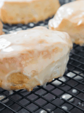 Air Fryer Maple Bar Donuts, golden and crispy, topped with a sweet maple glaze, ready to enjoy for breakfast or as a snack.