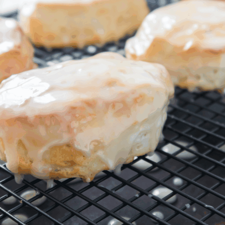 Air Fryer Maple Bar Donuts, golden and crispy, topped with a sweet maple glaze, ready to enjoy for breakfast or as a snack.