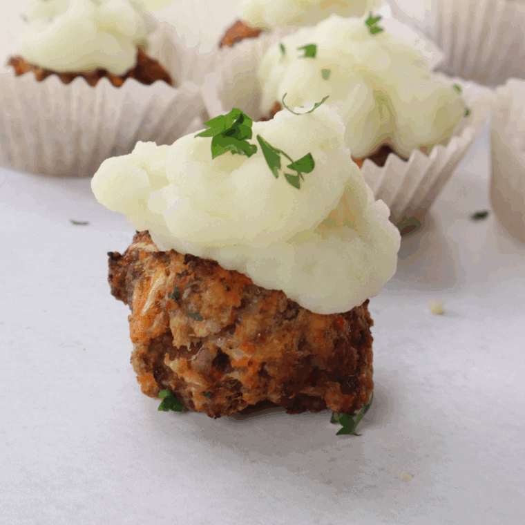 Air Fryer Meatloaf Cupcakes with Whipped Potato Topping, individual servings of meatloaf topped with fluffy whipped potatoes, cooked to perfection in the air fryer for a fun and flavorful meal.