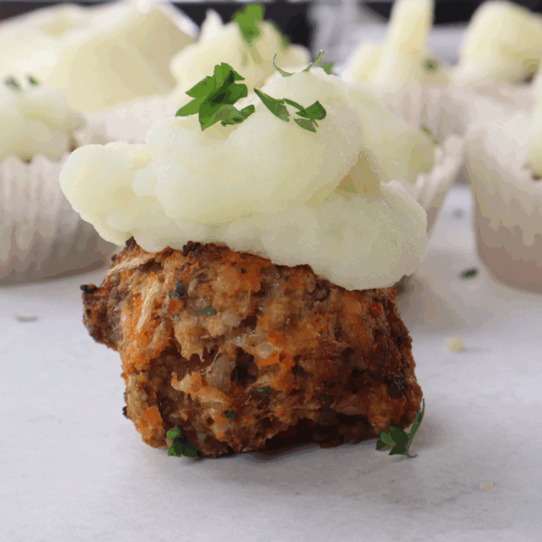 Air Fryer Meatloaf Cupcakes with Whipped Potato Topping, individual meatloaf cupcakes topped with fluffy mashed potatoes, made to perfection in the air fryer for a delicious, comforting meal.