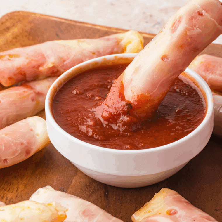 Golden, crispy Air Fryer Pepperoni Cheese Crisps made with melted cheese and savory pepperoni slices.
