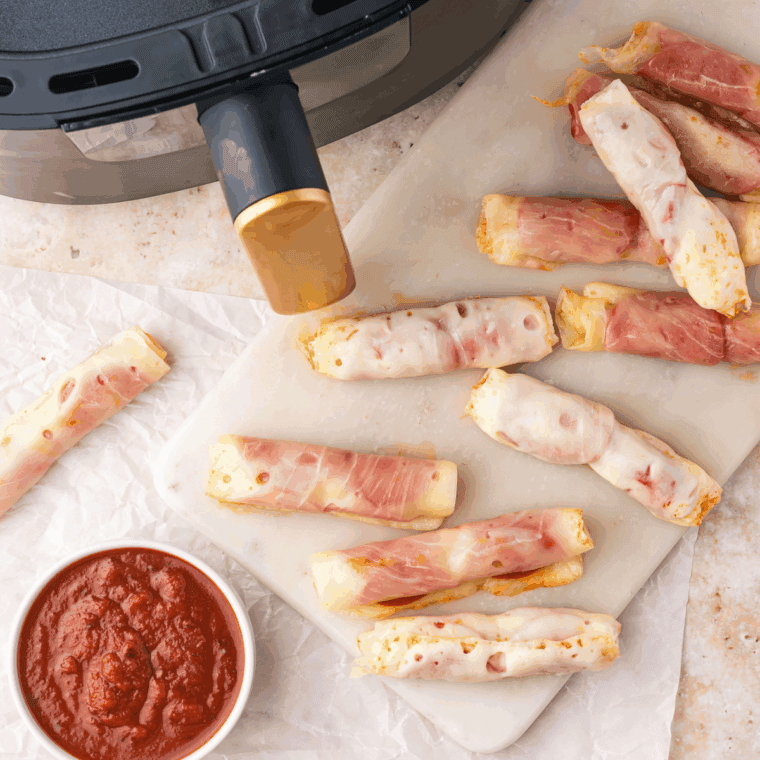 Crispy Air Fryer Pepperoni Cheese Crisps made with mozzarella cheese and pepperoni slices, ready for a savory snack.