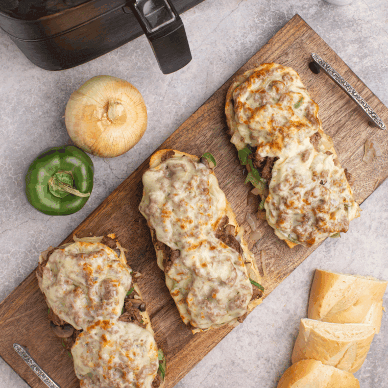Air Fryer Philly Cheesesteak Cheesy Bread on cutting board.