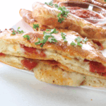 Air Fryer Pizza Turnovers with gooey cheese and savory pizza fillings, perfectly golden and crispy.