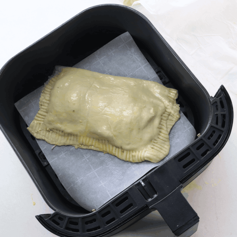 Place Air Fryer Pizza Turnovers in the air fryer basket.