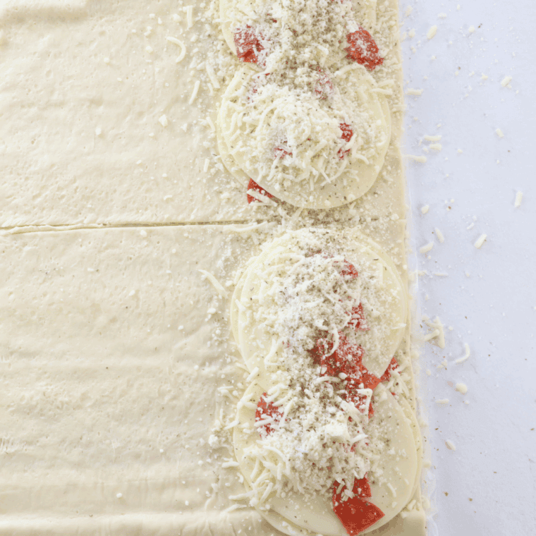 Add the fillings to the pizza turnovers.