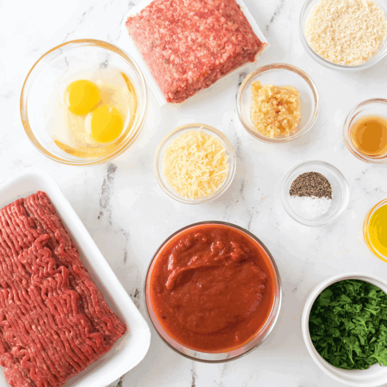 Ingredients needed for Air Fryer Spaghetti and Meatballs on kitchen table.