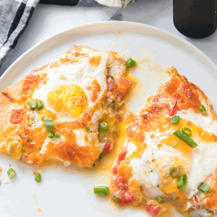 Air Fryer Tortilla Baked Eggs with a crispy tortilla base and a perfectly baked egg, ready to serve for breakfast or brunch.