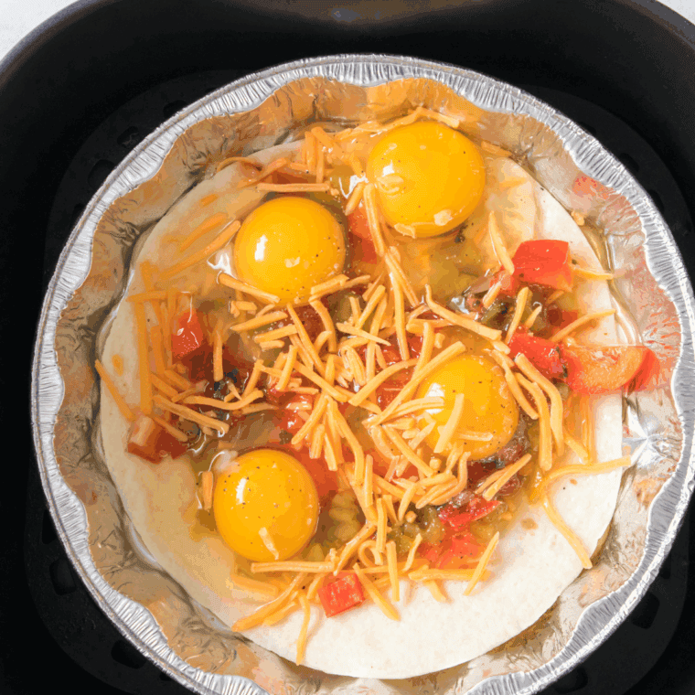 Place the filled tortilla into the air fryer basket.