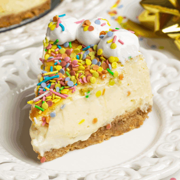 Cheesecake Factory Copycat Celebration Cheesecake with a rich creamy filling, graham cracker crust, and vibrant fruit topping, perfect for special occasions.