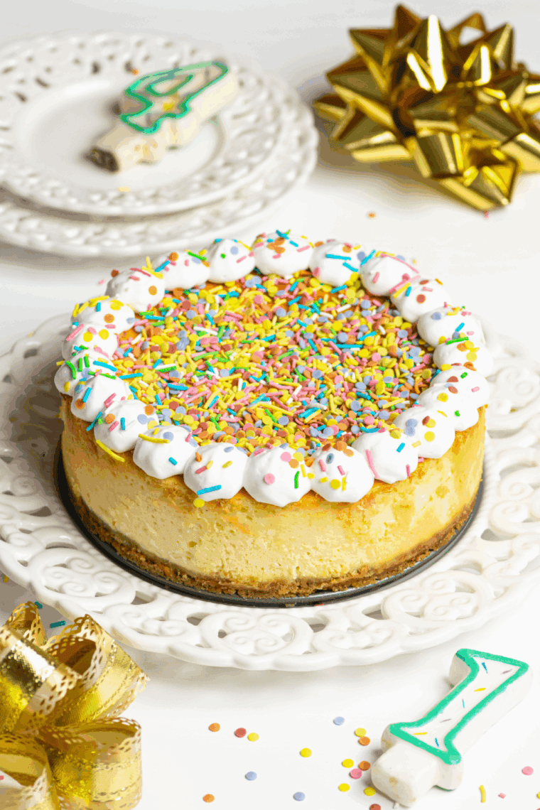 Cheesecake Factory Copycat Celebration Cheesecake on the kitchen table.