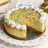 Cheesecake Factory Copycat Celebration Cheesecake featuring layers of creamy cheesecake, a graham cracker crust, and colorful fruit topping, perfect for special celebrations.