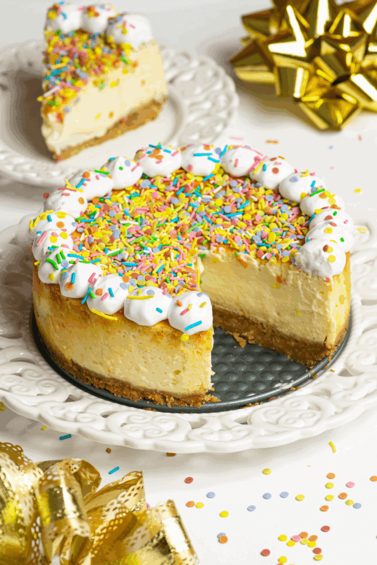 Cheesecake Factory Copycat Celebration Cheesecake featuring a creamy cheesecake filling, graham cracker crust, and vibrant fruit topping, perfect for any festive occasion.