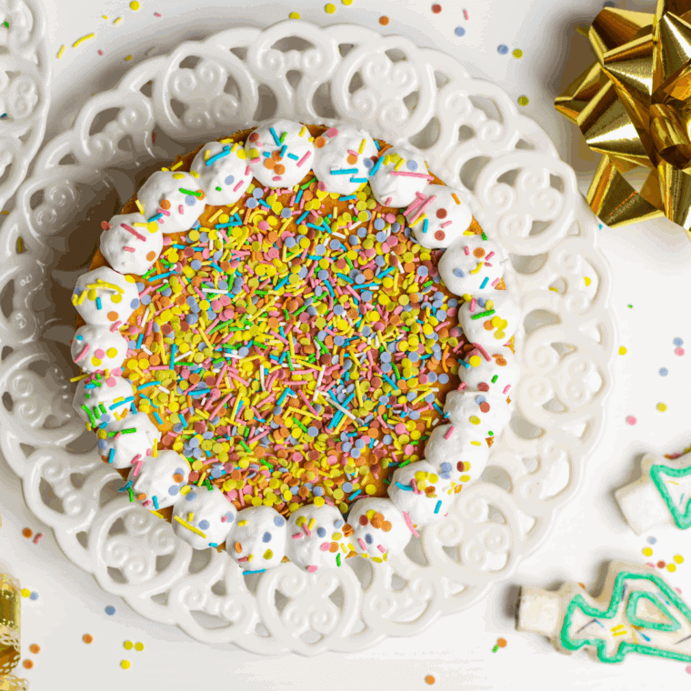Cheesecake Factory Copycat Celebration Cheesecake, featuring a creamy filling, graham cracker crust, and vibrant fruit topping for the ultimate dessert experience.