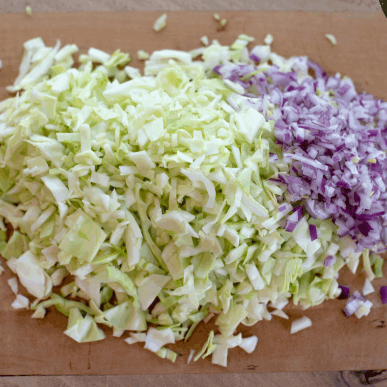Ingredients needed for Coleslaw (Cracker Barrel Copycat) on kitchen cutting board.