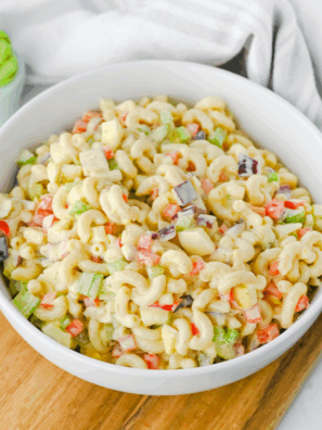 Gluten-Free Pasta Salad with fresh vegetables, topped with a flavorful dressing, ideal for picnics or a healthy meal.