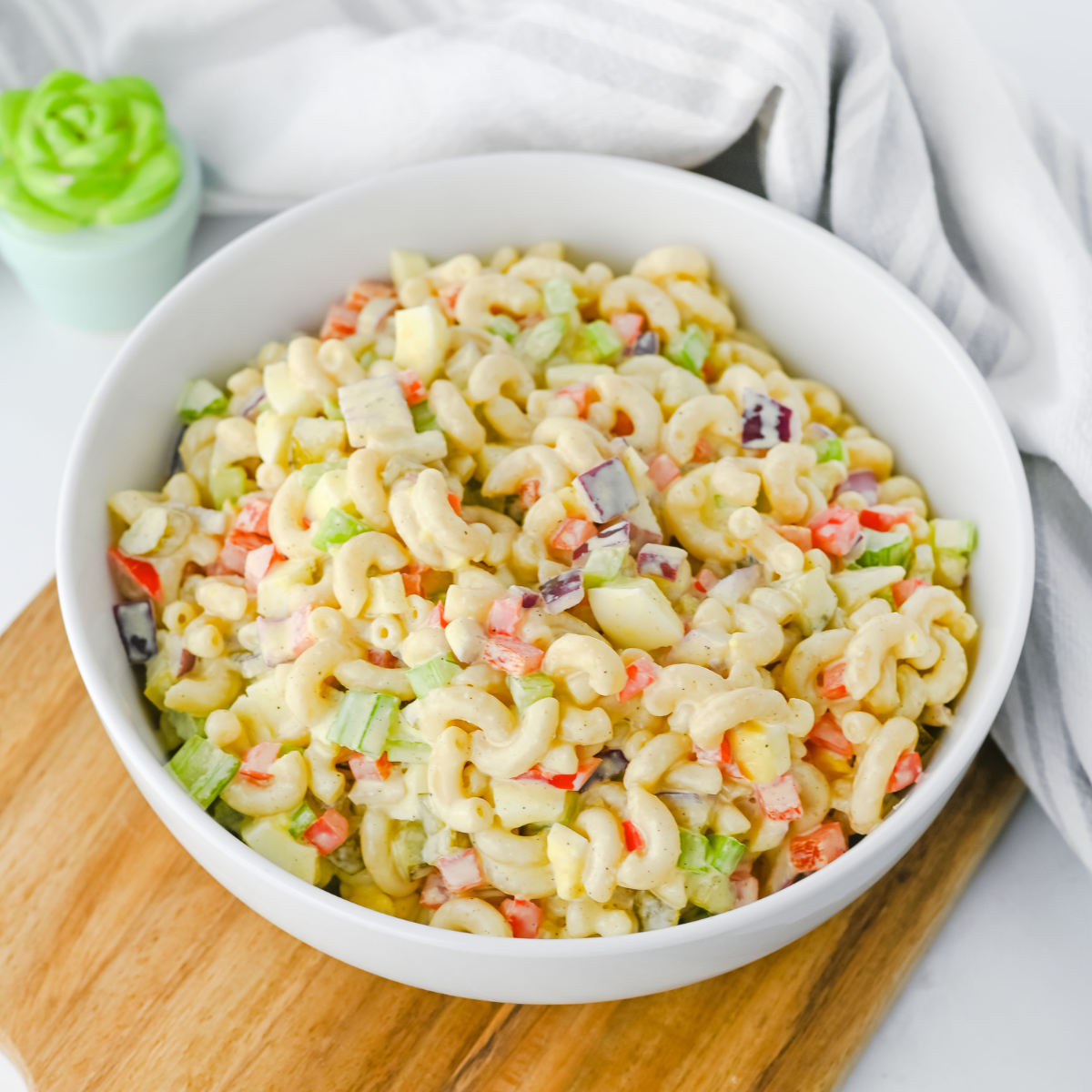 Gluten-Free Pasta Salad with fresh vegetables, topped with a flavorful dressing, ideal for picnics or a healthy meal.