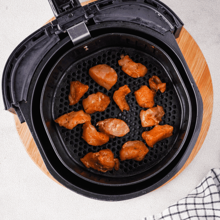 Air fryer display showing 380°F preheating with an empty basket ready for cooking.