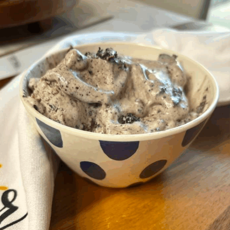 Creamy chocolate ice cream made in the Ninja Creami, loaded with crushed cookies and swirls of pudding, Ben & Jerry’s Dirt Cake style.
