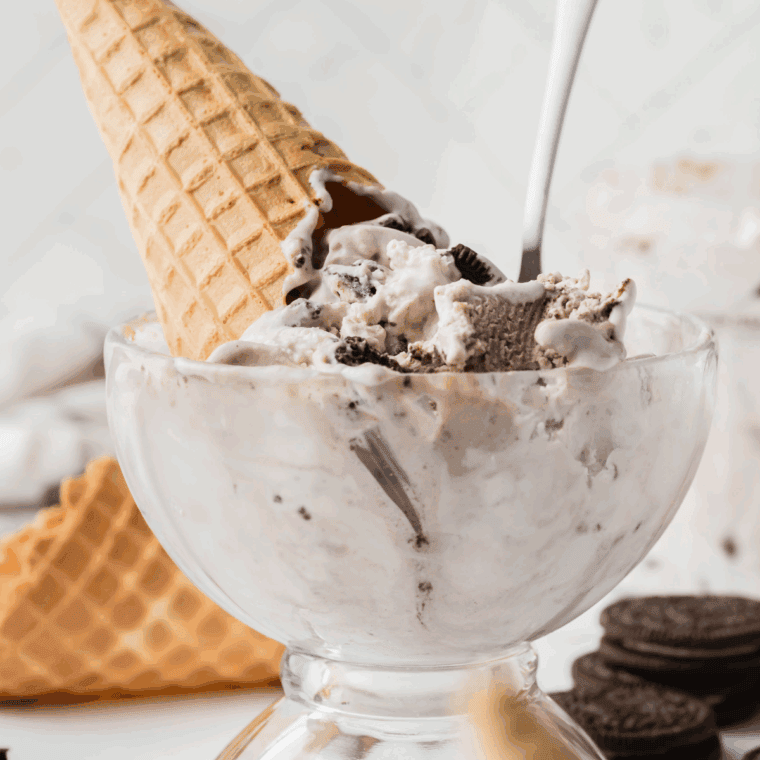 Close-up of creamy Dirt Cake Ice Cream made in the Ninja Creami, featuring chocolate cookie chunks and pudding swirls.