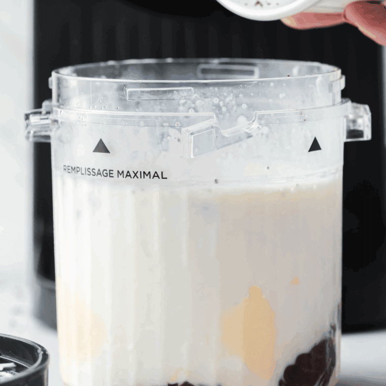 Add ingredients for the Jack in the Box Shake in the Ninja Creami pint container.