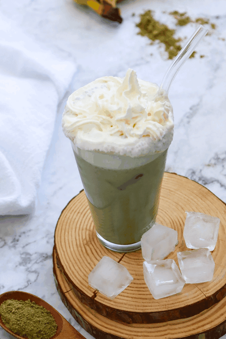 Smooth Ninja Creami Starbucks Matcha Green Tea Frappuccino with vibrant green matcha flavor, topped with whipped cream.