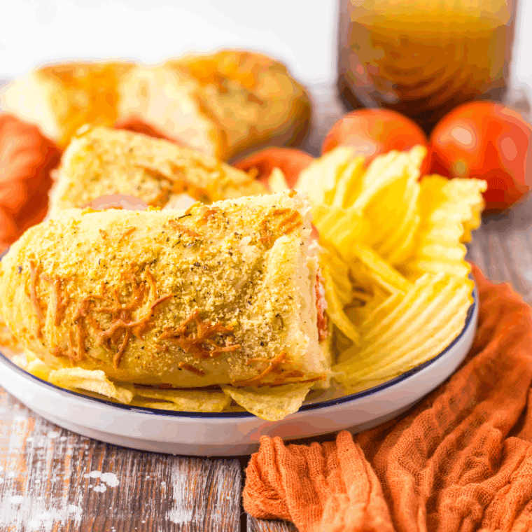 Homemade Subway Italian Herb and Cheese Bread, freshly baked with melted cheese and Italian herbs on top.