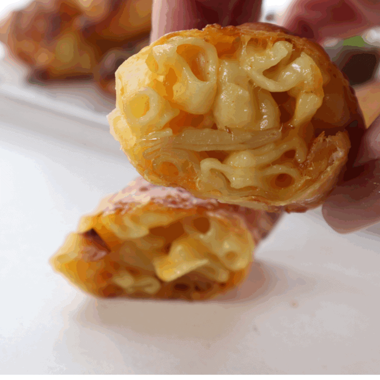 Plate of Air Fryer Mac And Cheese Egg Rolls.